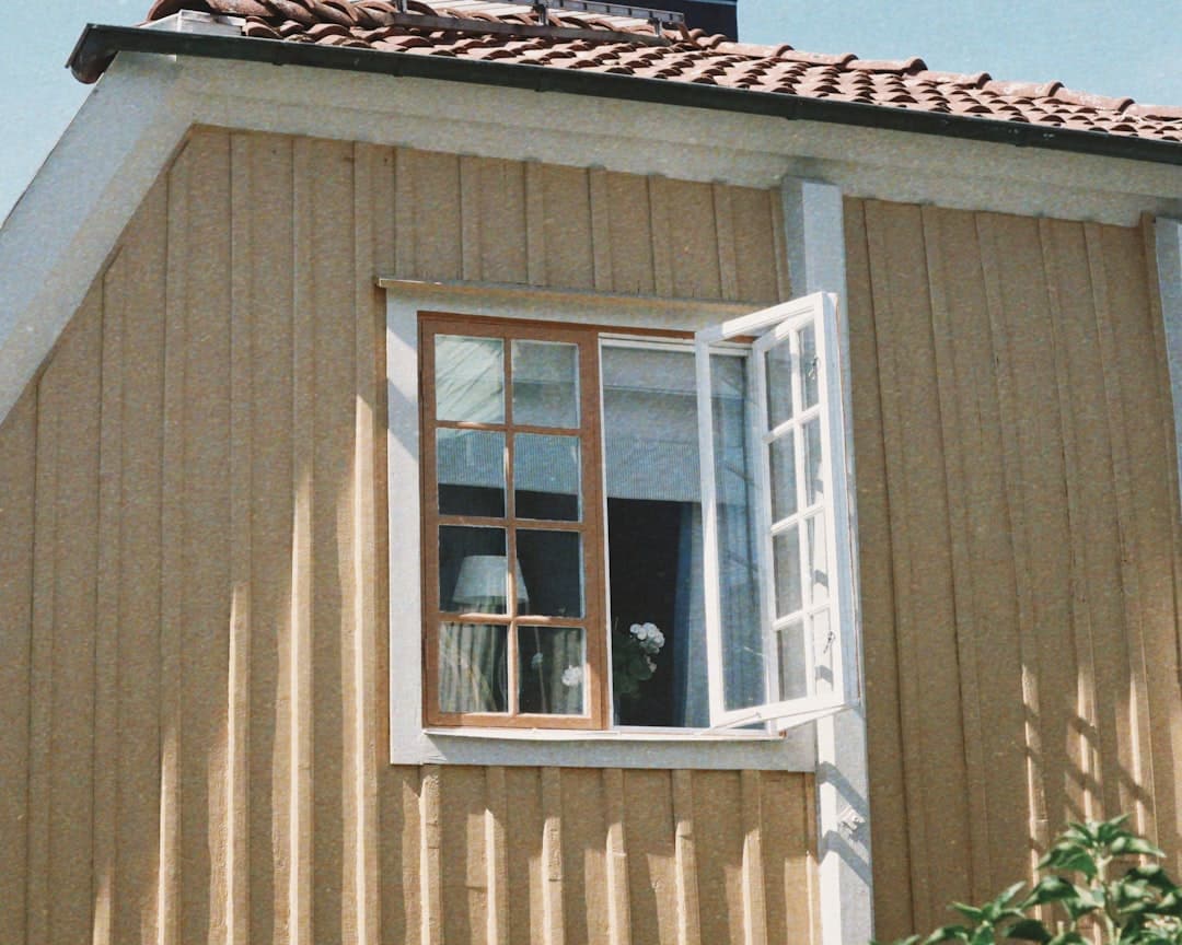 Beautiful modern suburban home with a green lawn under a bright, sunny sky, representing a valuable Northshore property.
