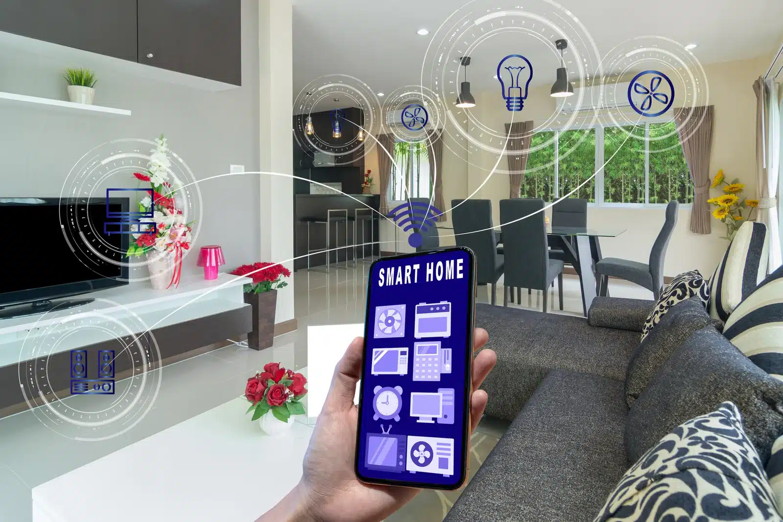 Smart-home-and-augmented-reality-technology-concept--hand-holding-smart-phone-presenting-the-smart-home-control-screen-and...