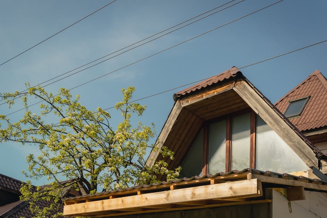 The bright, sunny exterior of a beautiful modern suburban home, representing a valuable Northshore property at the center of the commission discussion.
