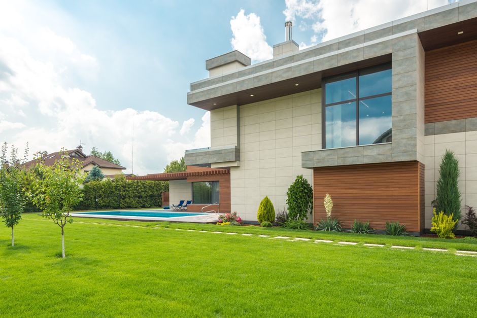 The bright, welcoming exterior of a modern suburban home on a sunny day, representing an ideal property on the Northshore market.