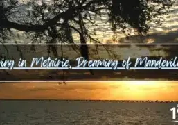Sunset view across Lake Pontchartrain from Mandeville showing the Causeway Bridge, representing the scenic Northshore lifestyle families dream of when considering a move from Metairie