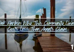 Oak Harbor Slidell blog post header image featuring wooden dock extending over calm water with boats moored nearby. Overlaid text reads 'Oak Harbor: Why This Community Living Costs Less Than Agents Claim' with 1 Percent Lists logo. Marina setting emphasizes Oak Harbor's dual golf and waterfront amenities value proposition.